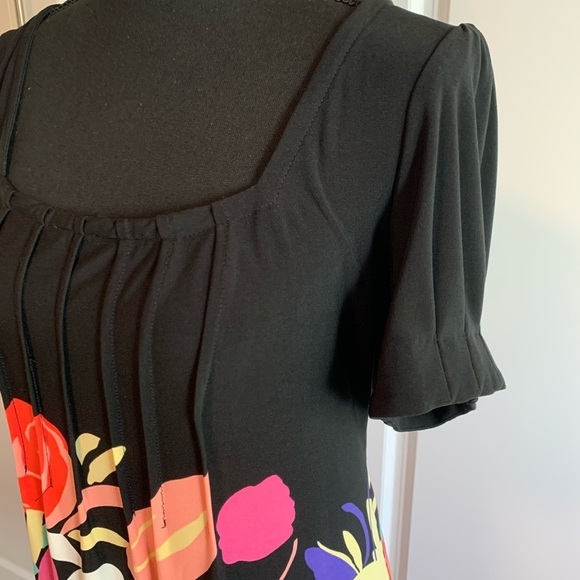 ECI Dresses & Skirts - ECI dress - black with large flower pattern on bottom.